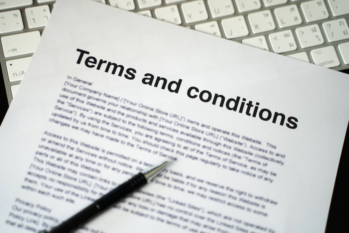 Terms and conditions businessman reviewing  terms and conditions of agreement office terms and conditions